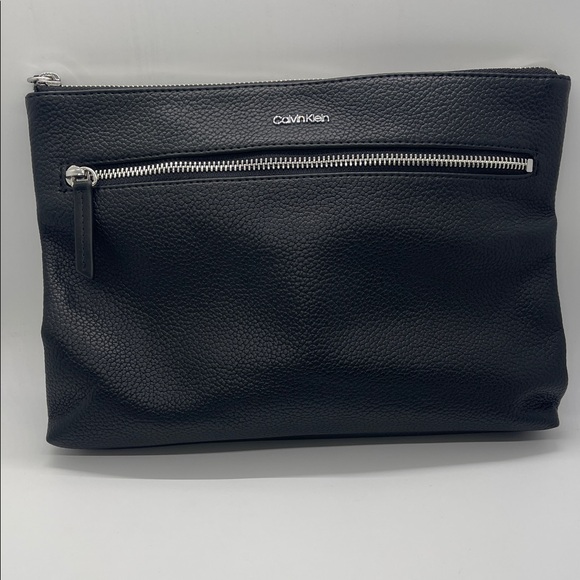 Calvin Klein Handbags - Calvin Klein Black Textured Clutch